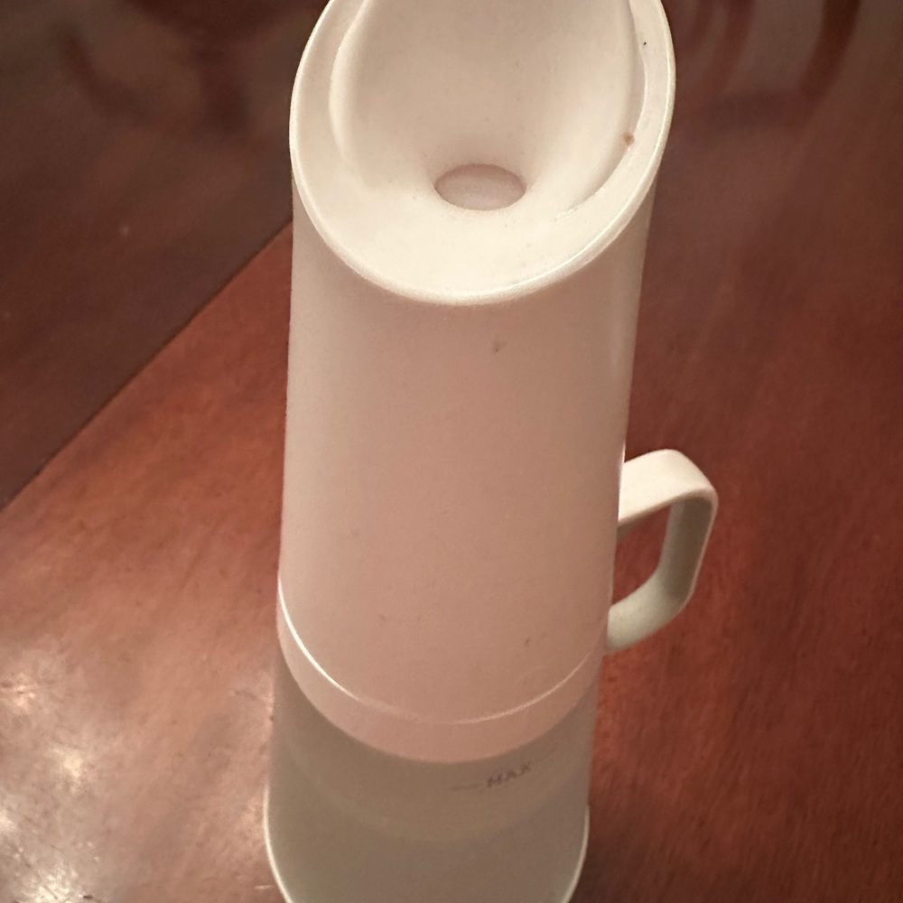White Grove collaboration laundry detergent dispenser glass